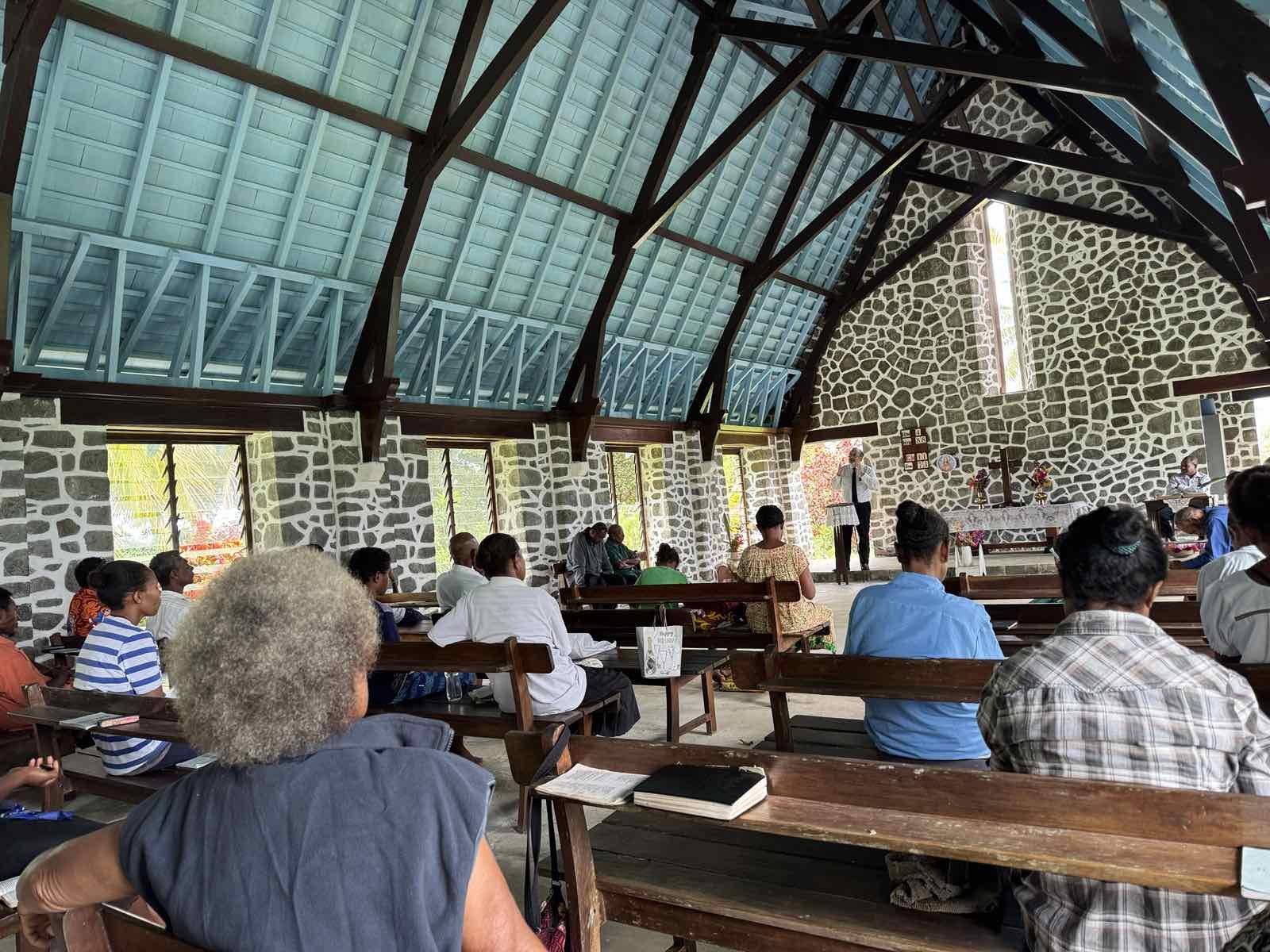 Church service taking place inside the Kwato church